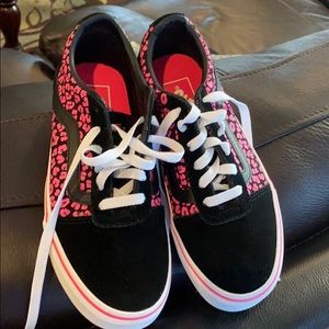 Pink and Black Vans sneakers